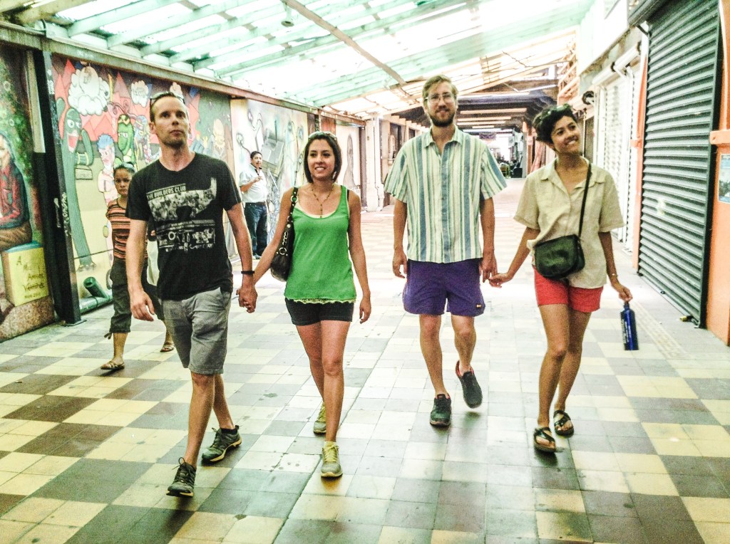 The cute couples walking through Pasaje Rodríguez 